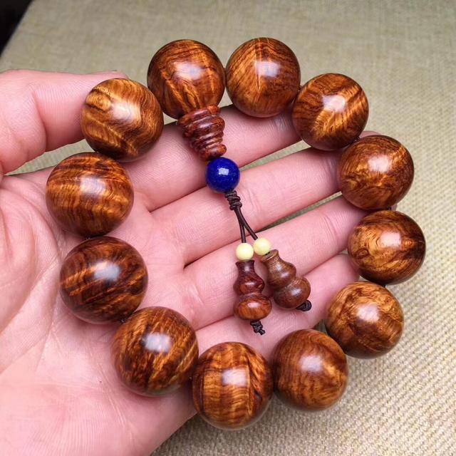 黄花梨木手串（黄花梨木手串图片）