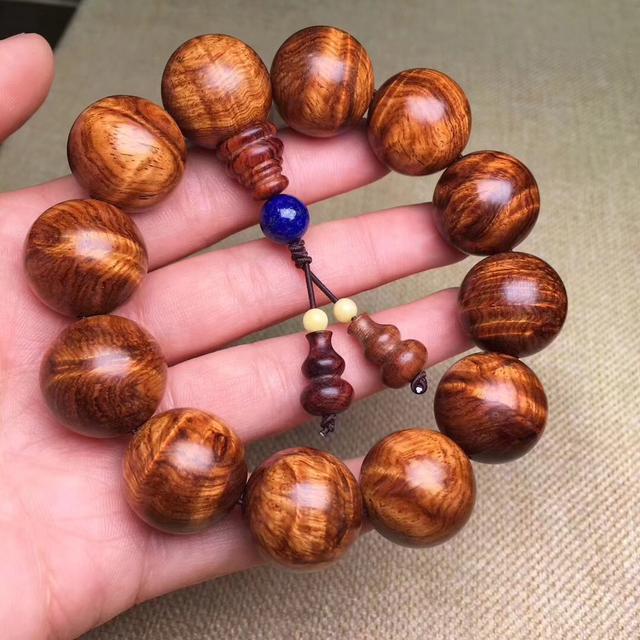 黄花梨木手串（黄花梨木手串图片）